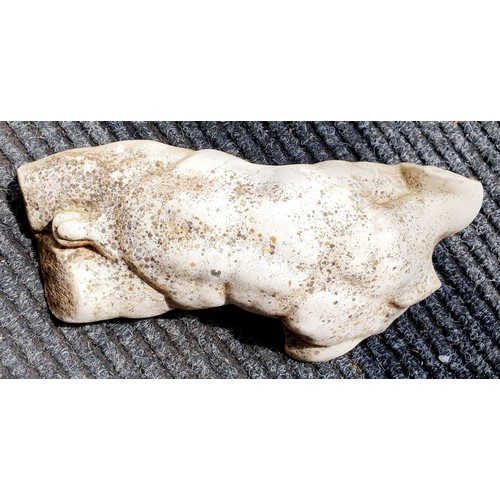 424 - A reconstituted stone male torso ornament, length 13