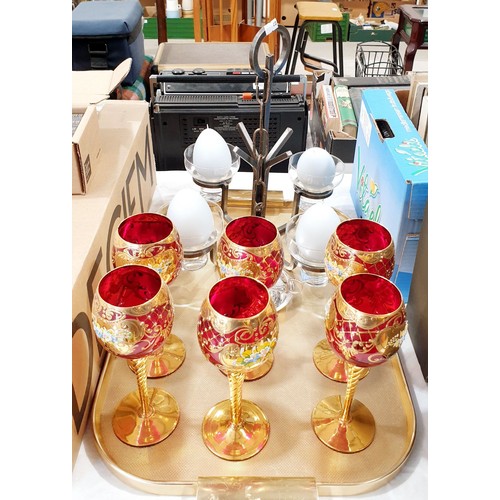 438 - A set of six cranberry and gilt wine glasses together with a four branch candle light. No shipping. ... 