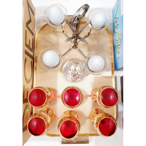 438 - A set of six cranberry and gilt wine glasses together with a four branch candle light. No shipping. ... 