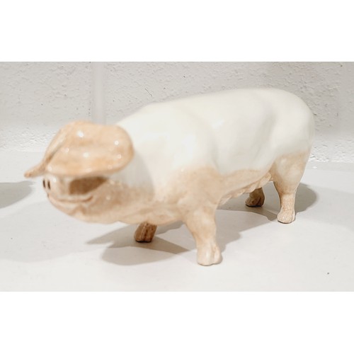 352 - An Excalibur ceramic model of a pig, length 6.5