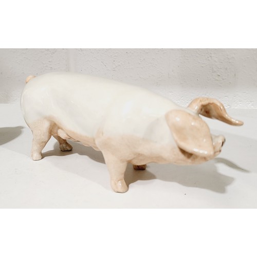 352 - An Excalibur ceramic model of a pig, length 6.5