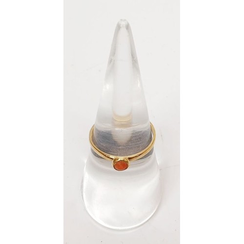 17 - An Edinburgh hallmarked 9ct gold ring set with coral, size N/O, 1.1g. UK shipping £14.