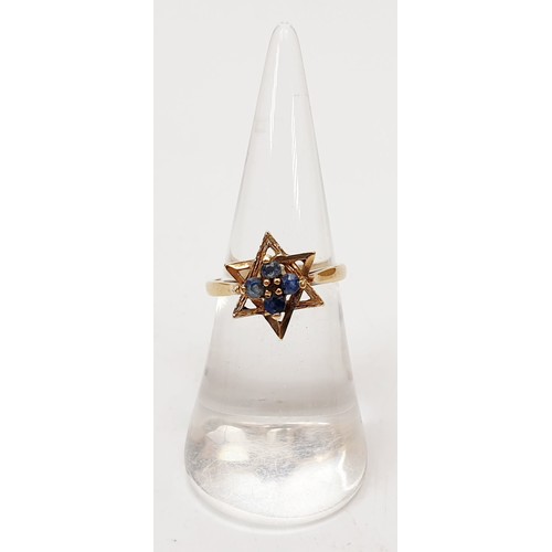 16 - A 1970s hallmarked 9ct gold ring set with sapphires, size L, gross weight 2.4g. UK shipping £14.