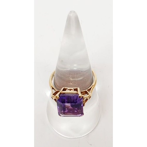 24 - A 9ct gold ring set with an amethyst, size O, gross weight 3.2g. UK shipping £14.