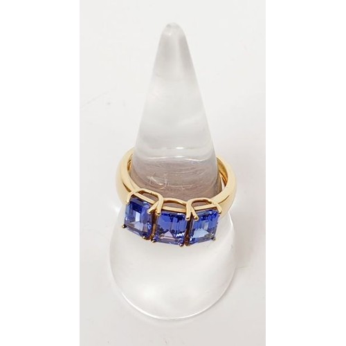 30 - A hallmarked 9ct gold ring set with tanzanite, size O, gross weight 3.4g. UK shipping £14.