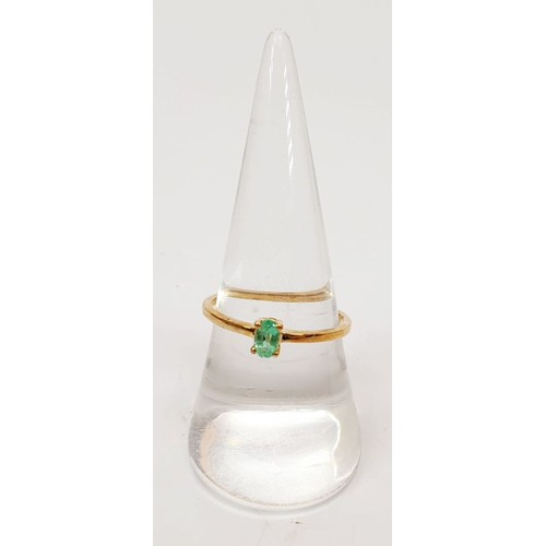 35 - A hallmarked 9ct gold ring set with emerald, size Q, gross weight 1.3g. UK shipping £14.