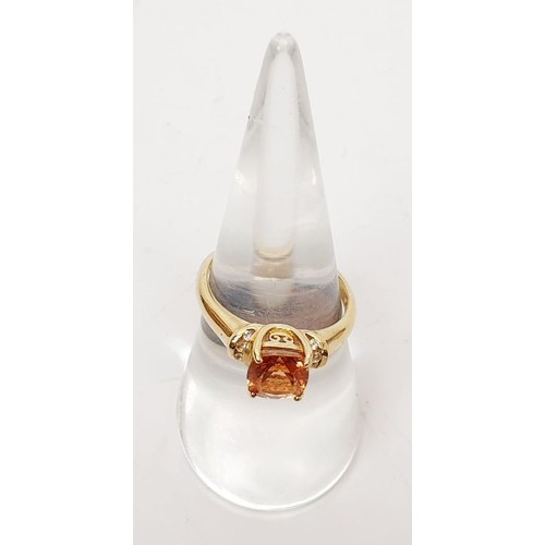 38 - A hallmarked 9ct gold ring set with ambersite and white topaz, size N/O, gross weight 2.5g. UK shipp... 