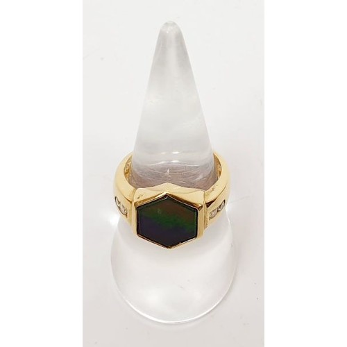 39 - A hallmarked 14ct gold ring set with ammolite and diamond, size N, gross weight 7g. UK shipping £14.