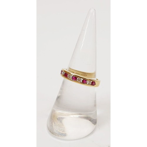 42 - A hallmarked 18ct gold ruby and diamond half eternity ring, size L, gross weight 3.1g. UK shipping £... 