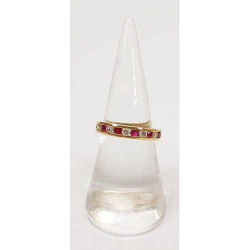 42 - A hallmarked 18ct gold ruby and diamond half eternity ring, size L, gross weight 3.1g. UK shipping £... 