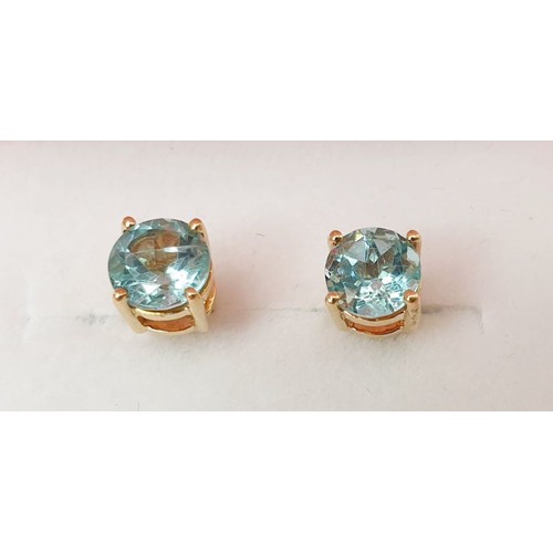 47 - A pair of 9ct gold earrings set with apatite. UK shipping £14.