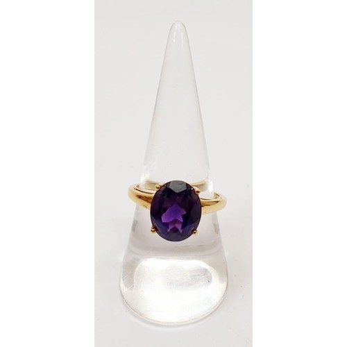 55 - A silver ring with 14ct gold plating, size Q. UK shipping £14.