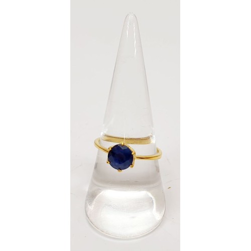 56 - A gold plated silver ring set with a sapphire, size P. UK shipping £14.