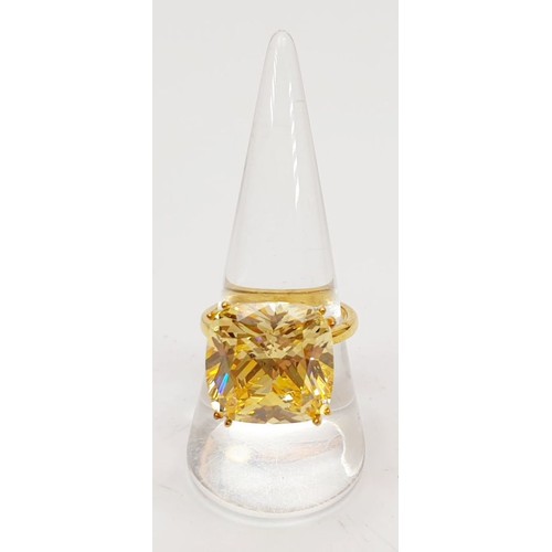 57 - A gold plated silver ring set with a simulated canary diamond, size P/Q. UK shipping £14.