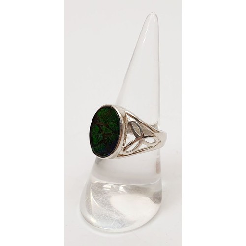 60 - A silver ring set with ammolite, size N/O. UK shipping £14.