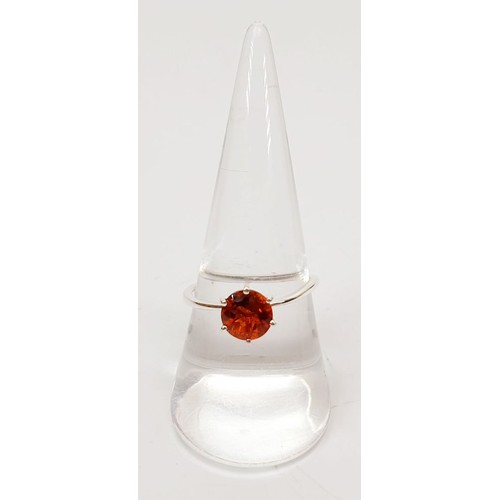 62 - A silver ring set with cherry citrine, size P. UK shipping £14.