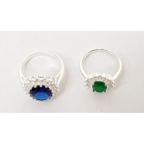 65 - Two silver rings set with coloured stones, sizes Q and R. UK shipping £14.