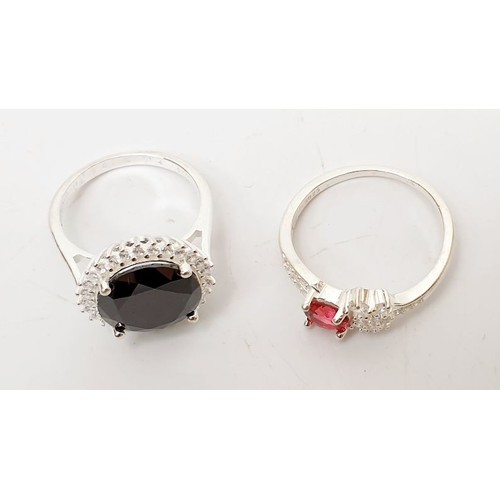 72 - Two silver rings set with coloured stones, size S/T and N. UK shipping £14.