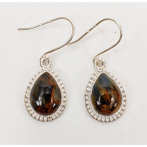 75 - A pair of silver earrings set with pietersite. UK shipping £14.