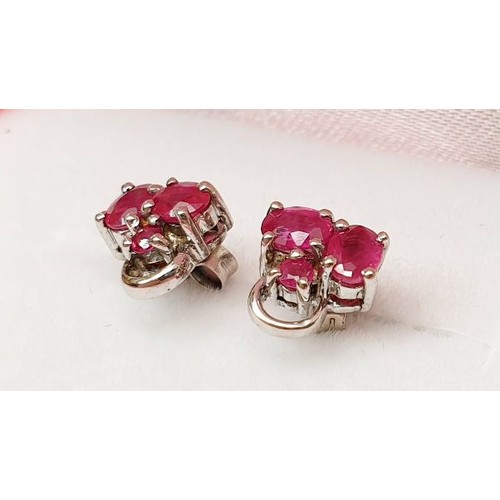 78 - A pair of silver earrings set with ruby. UK shipping £14.