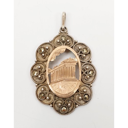 7 - An vintage 1000 silver pendant set with marcasite and an inset 14ct gold panel depicting the Parthen... 