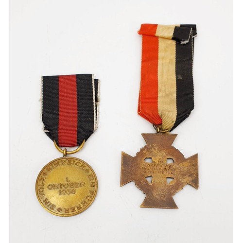 96 - A 1920s German naval medal, a 1938 Third Reich Nazi medal and a 1930's Adolf Hitler lapel badge. UK ... 