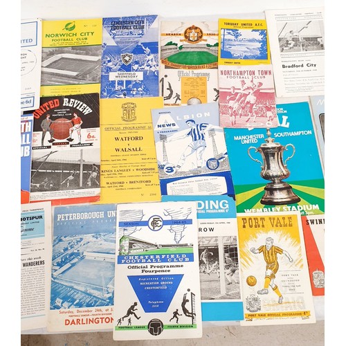 122 - Vintage football programmes. UK shipping £14.