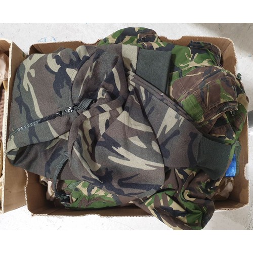 168 - Two boxes of military clothing. UK shipping £14.