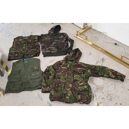 168 - Two boxes of military clothing. UK shipping £14.