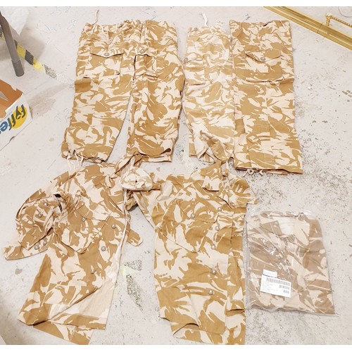 168 - Two boxes of military clothing. UK shipping £14.