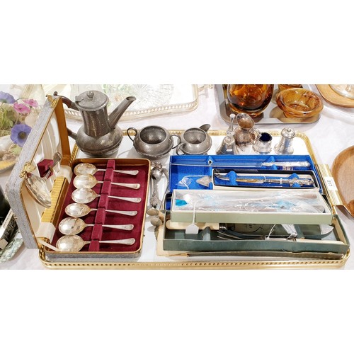 217 - A vintage boxed Oneida canteen salad serving set, other flatware, a three piece pewter tea set and o... 