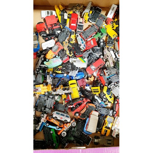 251A - A box of toy vehicles. UK shipping £14.