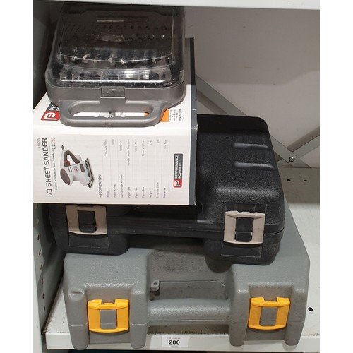 280 - Two power sanders, a drill and drill bits. No shipping. Arrange collection or your own packer and sh... 