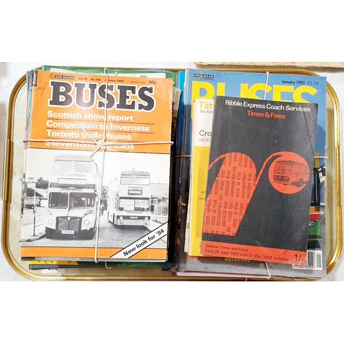 293 - A quantity of 1980/90s Buses magazines and timetables. UK shipping £14.