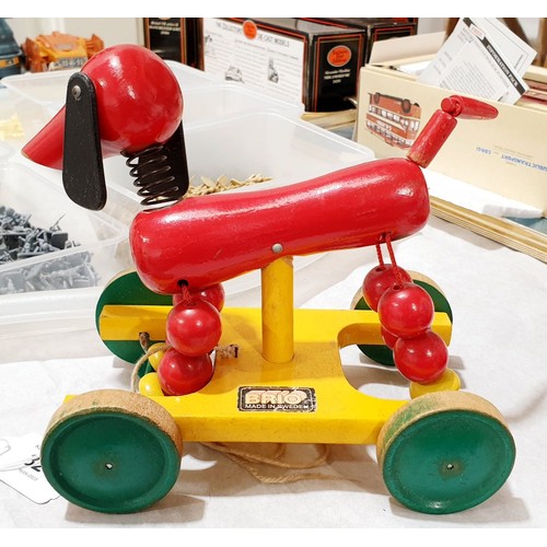 324 - A vintage Brio pull-along wooden dog, length 9