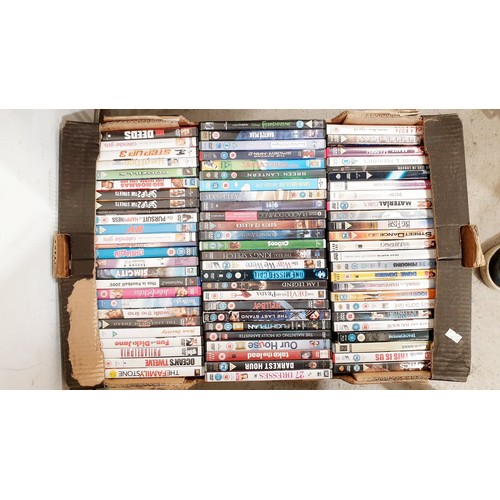 371 - Four boxes of DVDs. No shipping. Arrange collection or your own packer and shipper, please. Electric... 