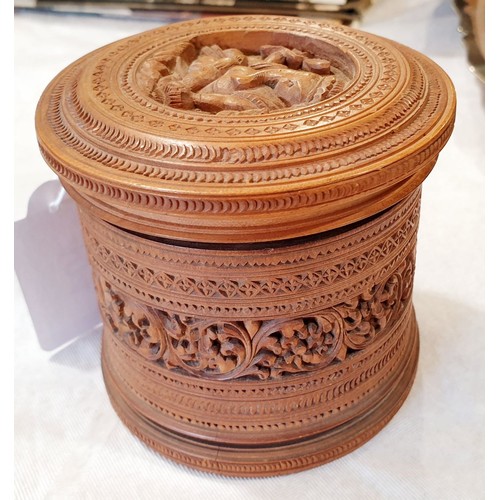 404 - A vintage intricately carved wooden box, the lid portraying Ganesh and the sides carved with foliage... 