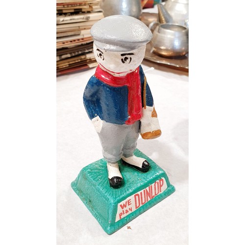 405 - A cast iron Dunlop golfer, height 5.5