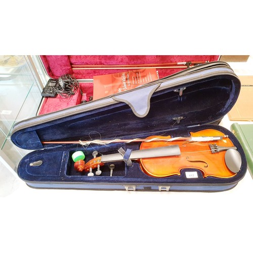 412 - A child's violin A/F. No shipping. Arrange collection or your own packer and shipper, please. Electr... 