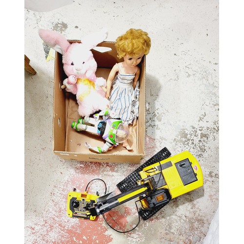 334 - A box of toys including a battery operated digger. No shipping. Arrange collection or your own packe... 