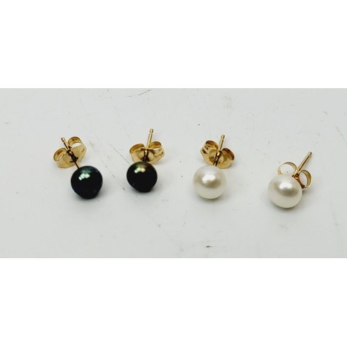 49 - Two pairs of 10ct gold and pearl earrings. UK shipping £14.