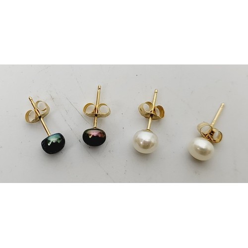 49 - Two pairs of 10ct gold and pearl earrings. UK shipping £14.