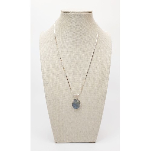 2 - A silver pendant set with labradorite on a silver chain. UK shipping £14.