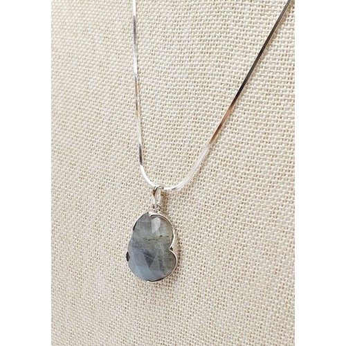 2 - A silver pendant set with labradorite on a silver chain. UK shipping £14.