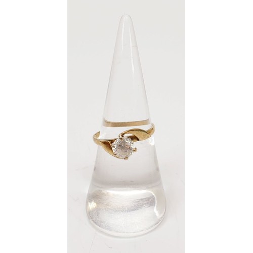 9 - A hallmarked 9ct gold ring set with a white stone, size N, gross weight 1.5g. UK shipping £14.