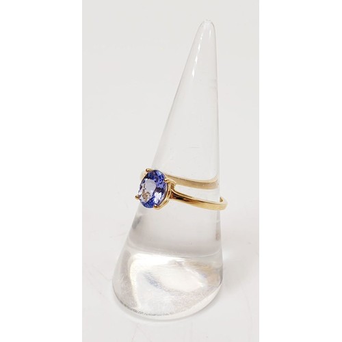 10 - A 9ct gold ring set with a AA tanzanite, size N/O, gross weight 1.8g. UK shipping £14.