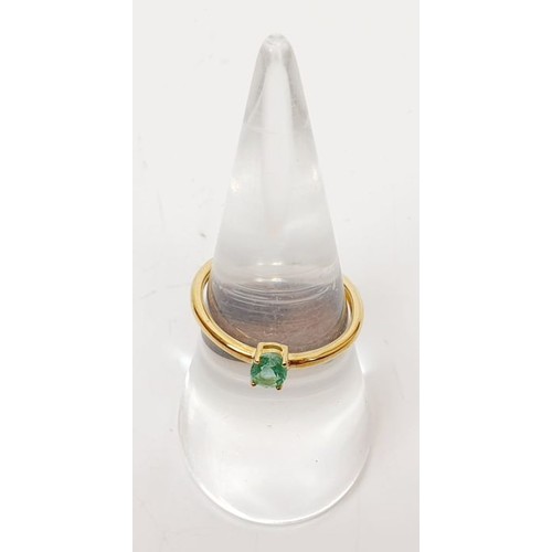 16 - A hallmarked 9ct gold emerald solitaire ring, size N/O, gross weight 1.2g. UK shipping £14.