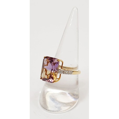 19 - A hallmarked 9ct gold ring set with ametrine and zircon, size Q, gross weight 3.2g. UK shipping £14.