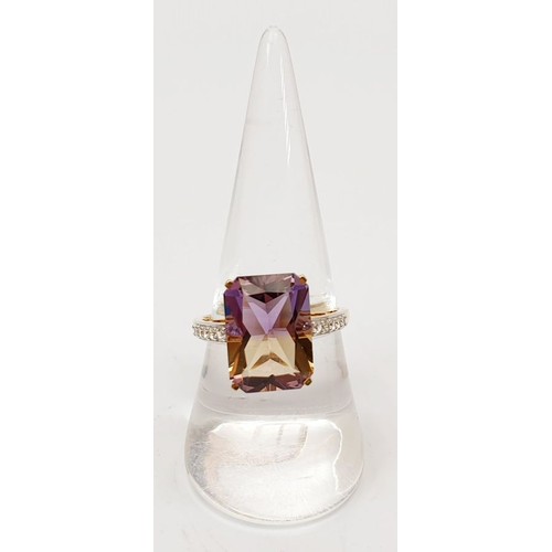 19 - A hallmarked 9ct gold ring set with ametrine and zircon, size Q, gross weight 3.2g. UK shipping £14.