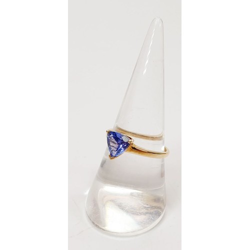 20 - A hallmarked 9ct gold triangular tanzanite solitaire ring, size O, gross weight 1.9g. UK shipping £1... 